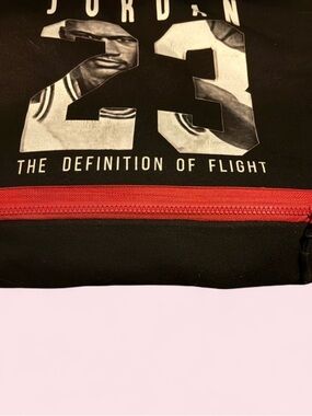 Jordan Black Graphic Hoodie with Red Zipper Accent